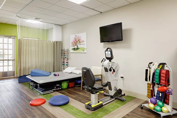 Rehabilitation exercise area with equipment