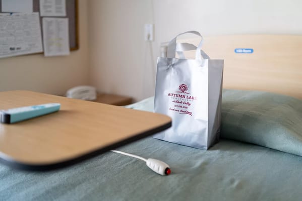 Close-up of a resident's room with a gift bag