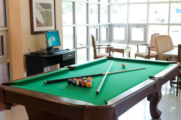 Pool table in a recreational area of the facility