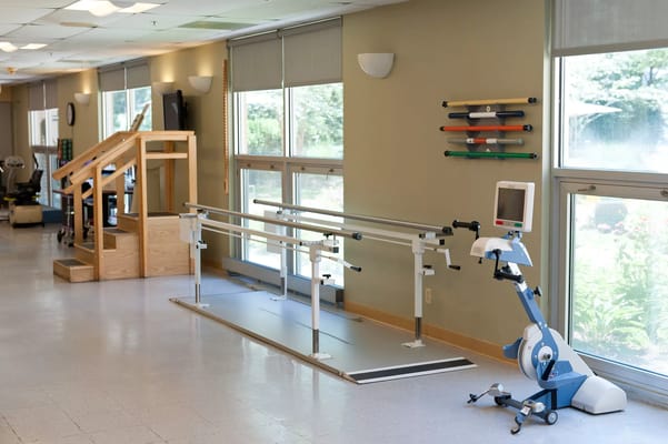 Rehabilitation equipment in a bright therapy room
