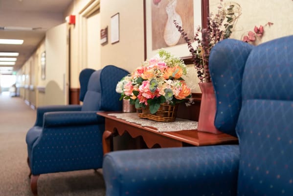 Brightly decorated sitting area with flowers