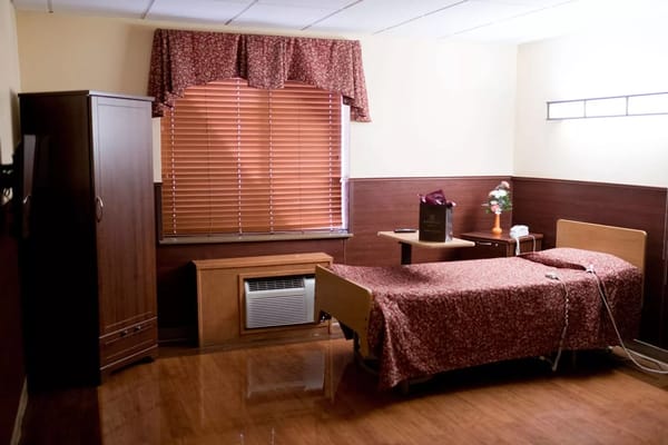 Cozy private resident room with warm decor