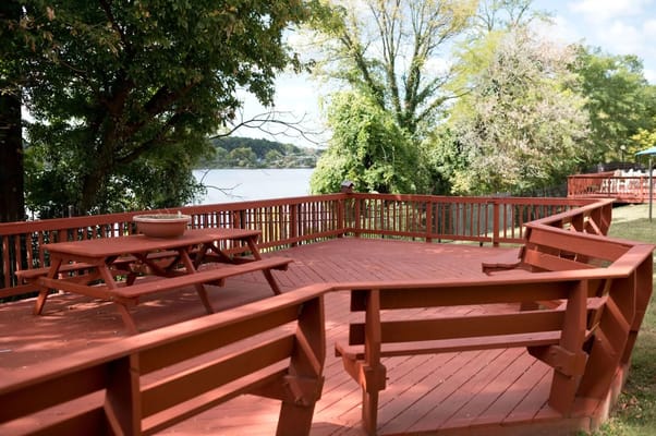 Outdoor deck with seating by the lake