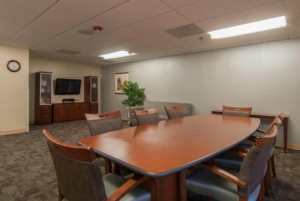 Interior meeting room with a large table and chairs
