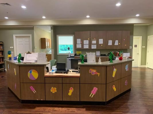 Front desk area of a healthcare facility with decorations
