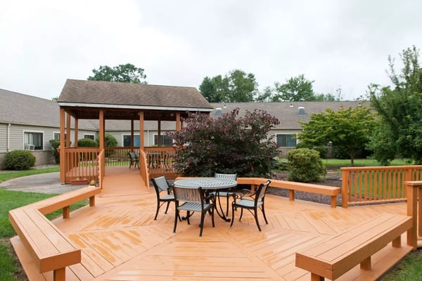 Outdoor seating area with benches and gazebo