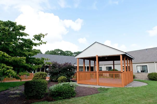 Outdoor gazebo in a landscaped area
