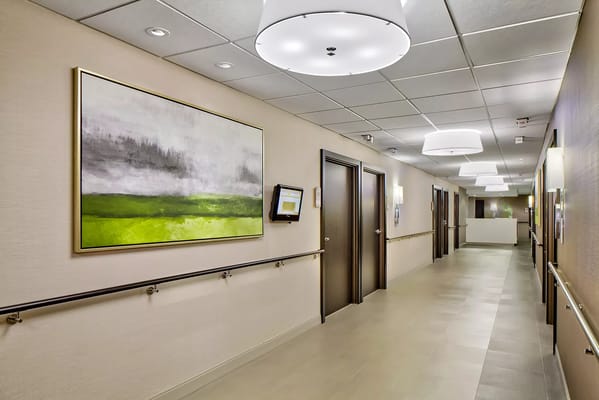 Interior hallway with artwork and lighting