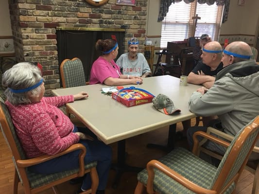 Residents engaged in a fun board game activity