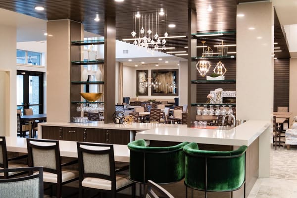 Modern lounge with seating and decorative lighting