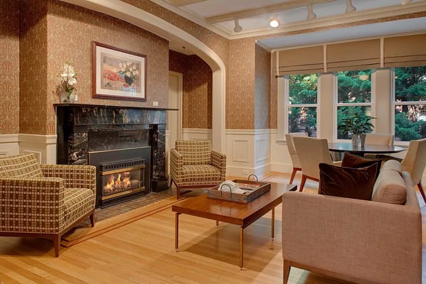 Warm living room with a fireplace and comfortable seating