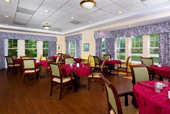 Dining room with tables set for meals