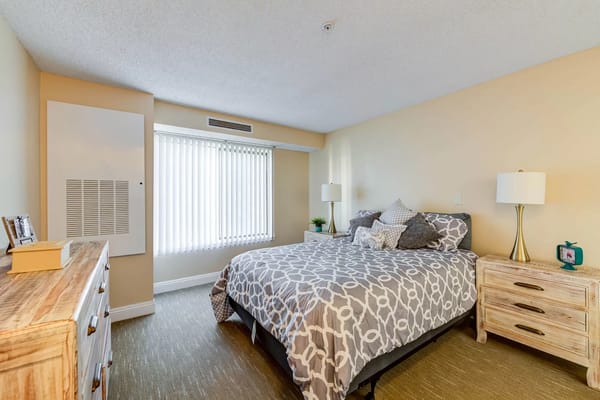 Cozy interior of a resident bedroom in the facility