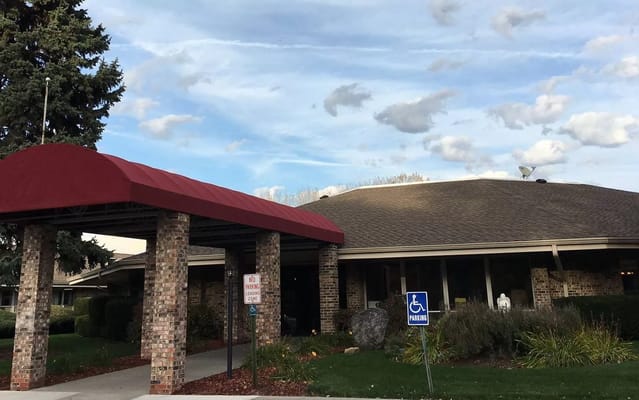 Entrance of Azria Health Montclair facility with covered awning