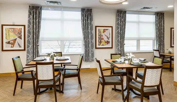 Brightly decorated dining area with tables set for meals