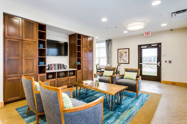 Bright common area with comfortable seating and decor