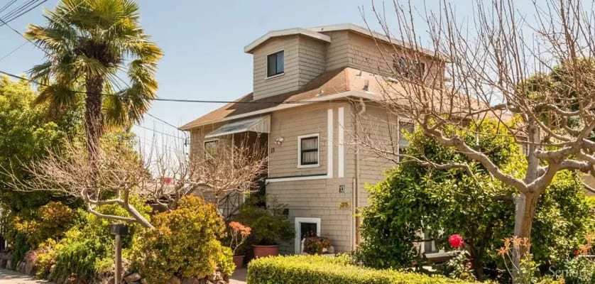 Exterior view of a building surrounded by greenery