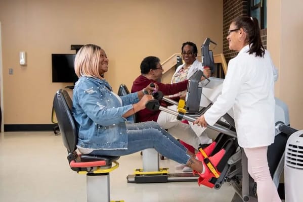 Residents engaging in physical therapy exercises