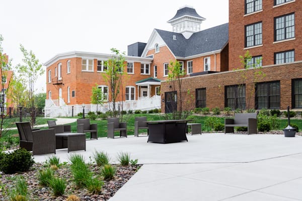 Outdoor seating area with garden landscaping