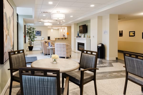 A welcoming interior common area with seating and decor