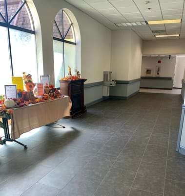 Bright corridor with a seasonal display and festive decor