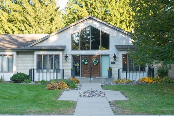 Building entrance with landscaping and pathway