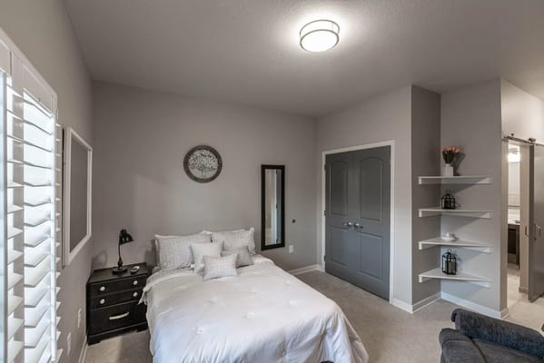 Cozy resident room with a bed and decor