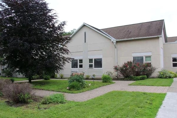 Exterior view of the Beechtree Center with garden area