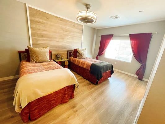 Cozy shared bedroom with two single beds