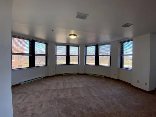 Bright, spacious interior room with large windows