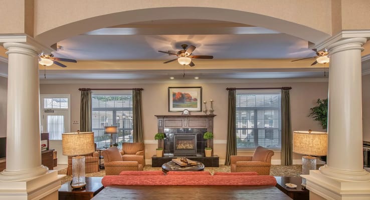 Common area with seating and a fireplace