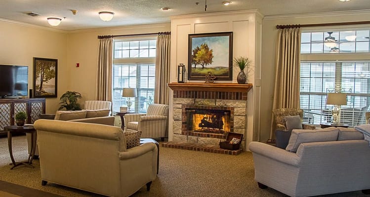 Cozy common area with seating and a fireplace