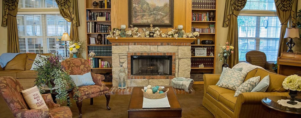 Cozy common area with comfortable seating and a fireplace