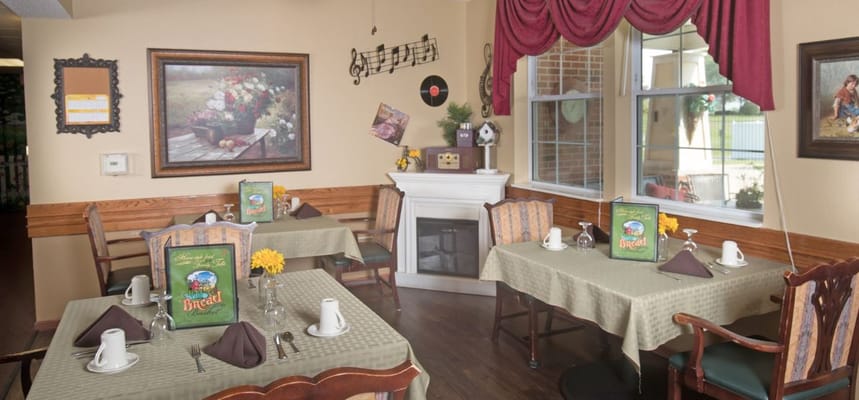 Dining area with tables set for a meal
