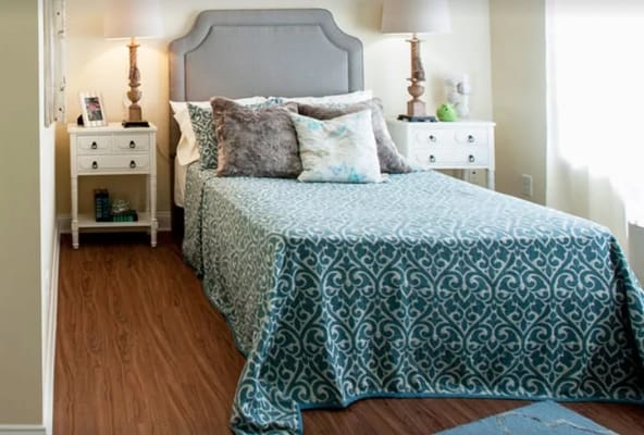 Cozy bedroom with a bed and decorative pillows
