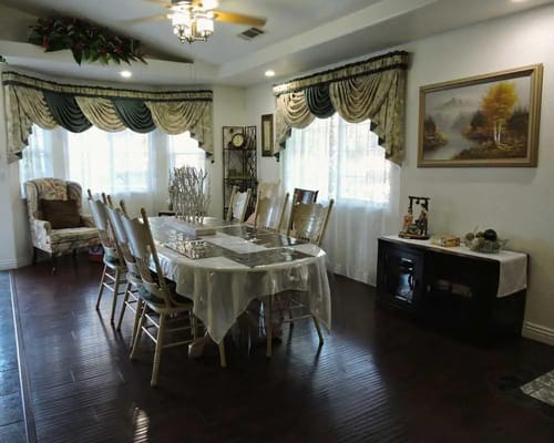 Dining room with a large table and chairs