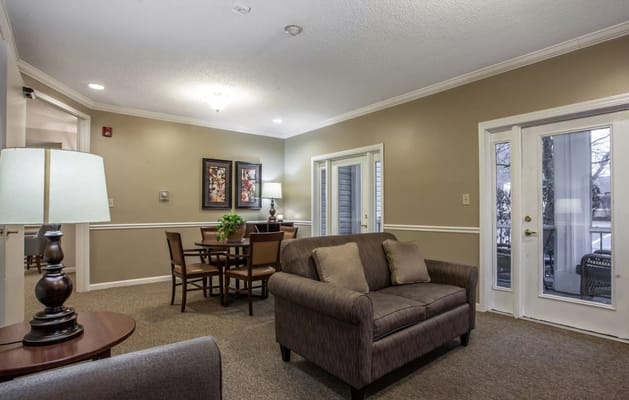 Interior common area with seating and dining table