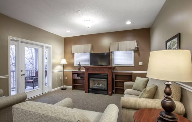 Cozy living room with fireplace and seating
