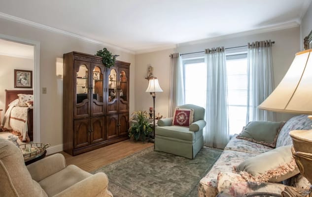 Cozy common area with seating and natural light