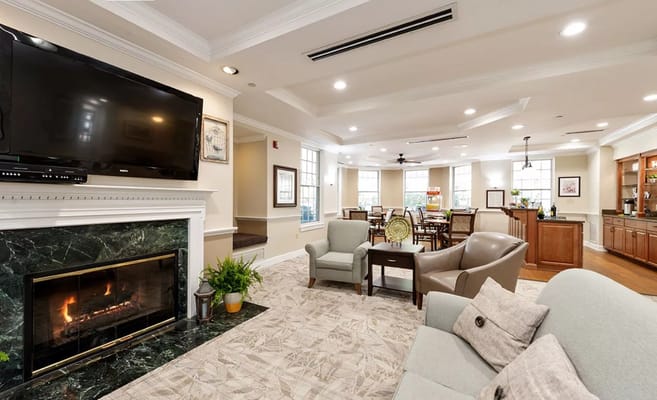 Common area with seating and a fireplace