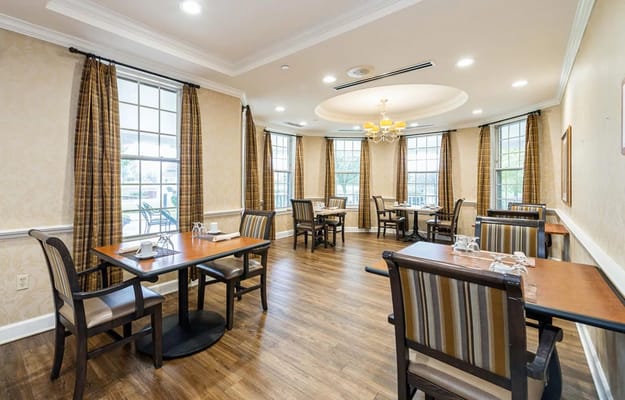 Dining room interior with tables and chairs