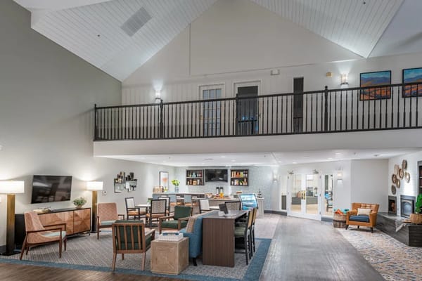 Bright interior common area with seating and decor