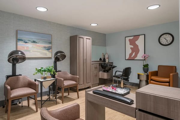 Hair salon interior with multiple styling stations