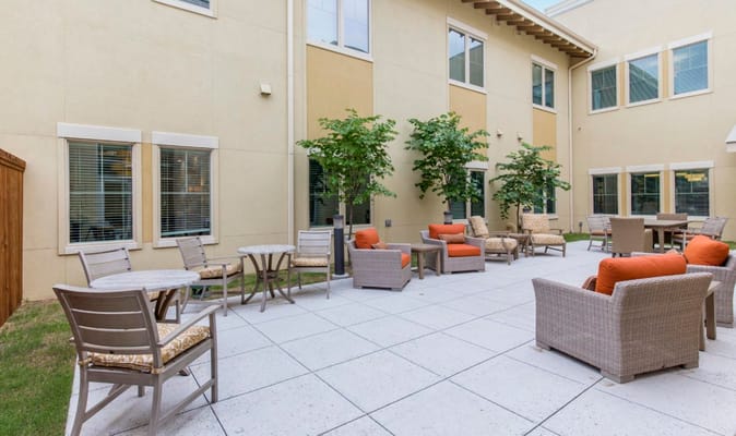 Outdoor seating area with chairs and tables