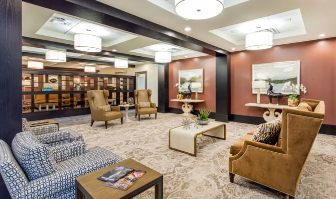 Bright interior common area with seating and decor