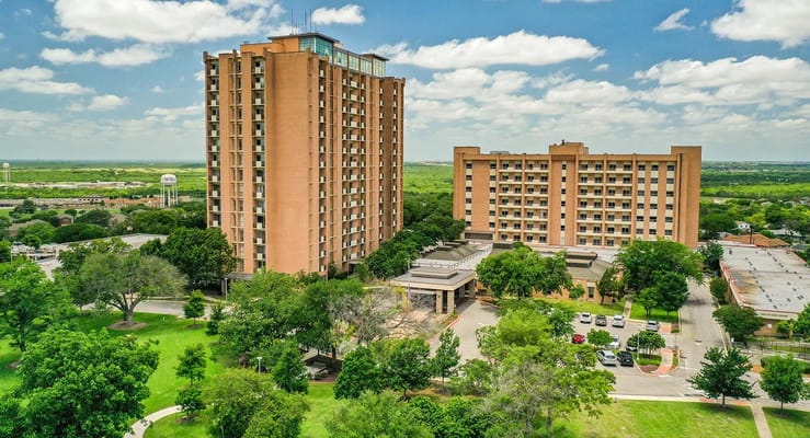 Aerial view of Blue Skies of Texas East facility with green spaces