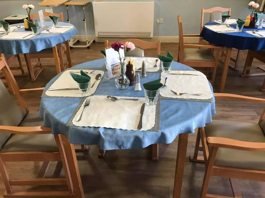 A dining room table set for a meal