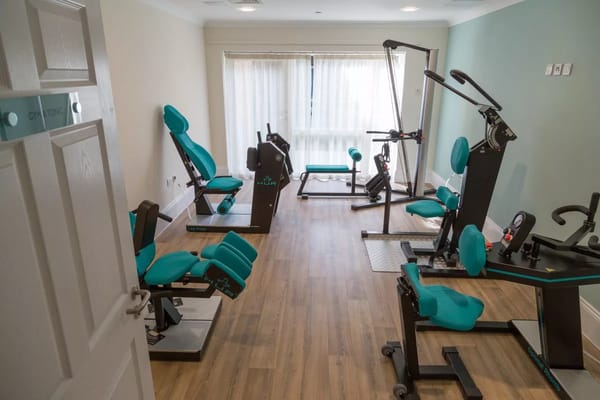 Modern gym equipment in a bright fitness room