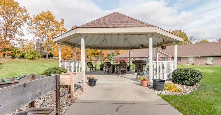 Outdoor gazebo in a landscaped area