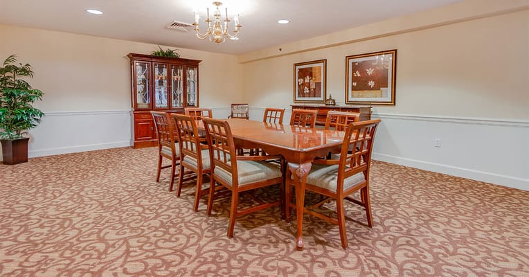 Dining room with wooden tables and chairs